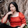 Filipino woman in red blouse